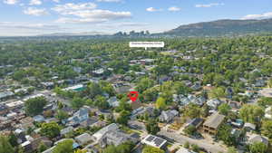 Aerial view of property's location with a mountainous background