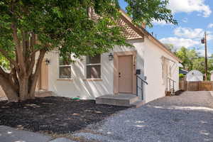 View of front of home featuring stucco siding