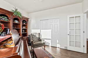 Office space with wood finished floors