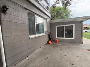 View of side of property featuring a patio