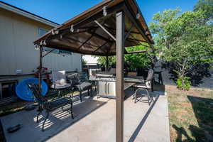 View of patio / terrace with a gazebo