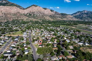 Aerial view of property's location with nearby suburban area