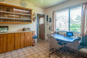Office space featuring light flooring