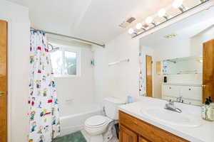 3rd Full bathroom in the basement with vanity and shower / bath combo