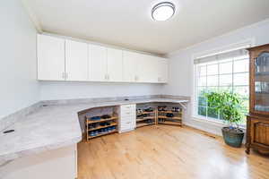 multi-purpose room adjacent to dining room. Great for home office, or easily convert back to separate dining room