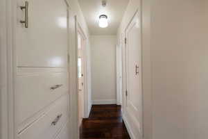 Main floor hallway leading to two main floor bedrooms