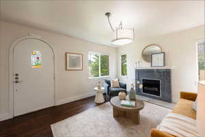 Living area featuring fireplace and wood finished floors