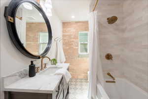 Mian floor full bathroom, beautifully tiled.