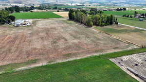 Aerial view of sparsely populated area featuring farmland