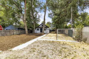 View of fenced backyard