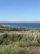 Water view featuring a mountainous background