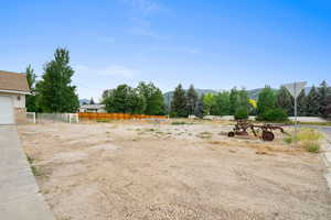 View of yard with a mountain view
