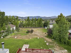 View of yard featuring a mountain view