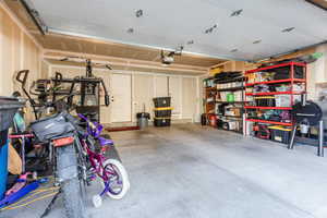 Garage featuring a garage door opener