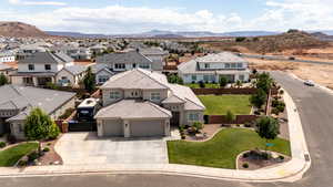 Aerial view of residential area with a mountainous background