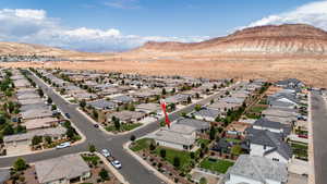 View of property location with a mountainous background and nearby suburban area