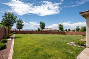 View of fenced backyard