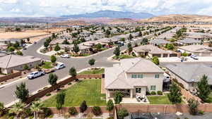Aerial view of residential area featuring mountains