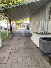 View of patio / terrace with an attached carport