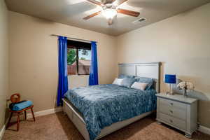 Bedroom featuring carpet floors and a ceiling fan