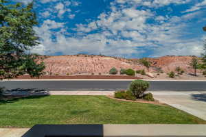 View of concrete road with a mountain view