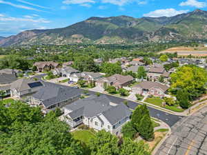 Aerial view of residential area featuring mountains