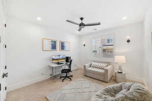 Home office featuring carpet floors, ceiling fan, and recessed lighting