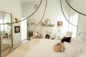 Bedroom with a high ceiling