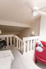 Bedroom with vaulted ceiling
