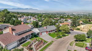 Aerial view of residential area featuring mountains