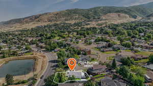 View of property location with property parcel outlined, nearby suburban area, and a water and mountain view