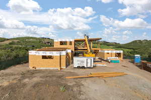 View of front of house featuring a mountain view