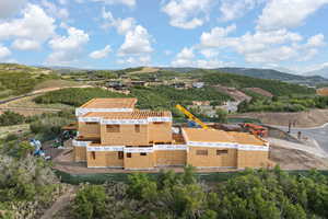 View of subject property with mountains