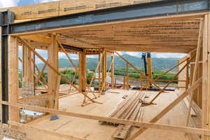 Miscellaneous room with a mountain view and plenty of natural light