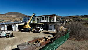 Rear view of house with a mountain view