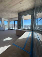 Corridor with wood ceiling