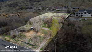 Aerial view of both properties - only Property #2 (.46 acres) is offered in this listing.