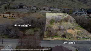 Aerial view of both properties - only Property #2 (.46 acres) is offered in this listing.
