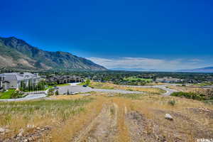 Mountain view featuring nearby suburban area