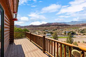 Front door Wooden terrace with a mountain view