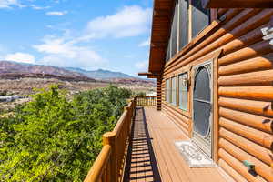 Front door of Balcony featuring a mountain view