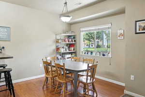 Dining room with wood finished floors