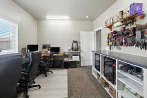 Office with light wood finished floors