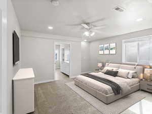 Bedroom with recessed lighting, light colored carpet, connected bathroom, a textured ceiling, and a ceiling fan