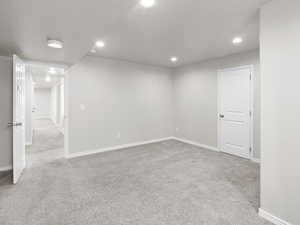 Bedroom with carpet flooring and recessed lighting