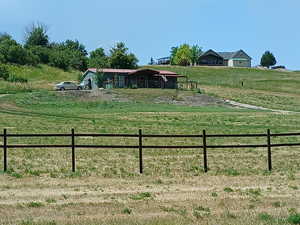 View of yard with a view of rural / pastoral area