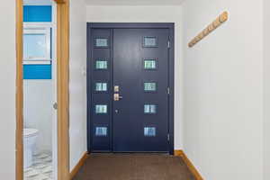 Entryway featuring baseboards