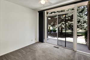 Main Bedroom room with carpet floors and a ceiling fan