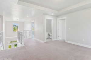 Empty room featuring carpet flooring and recessed lighting