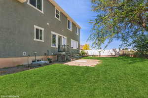 Back of house with stucco siding